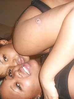 Big Breasted Black Making Out With Her Beautiful Lesbian Girlfriend