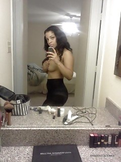 Bitch Shows Off Her Tight Figure While Posing Hot On Camera