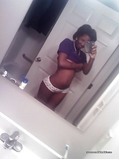 Dirty Ebony Babe In Attractive Undie Flashing Her Bristols