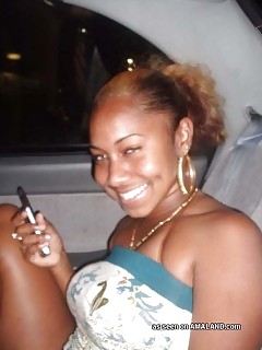 Photoset Of A Black Honey Showing Her Pierced Pussy