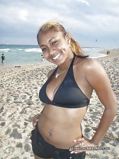 Photoset Of A Black Honey Showing Her Pierced Pussy