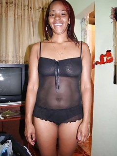 Black Babe Wearing Panties Demonstrates Her Boobies