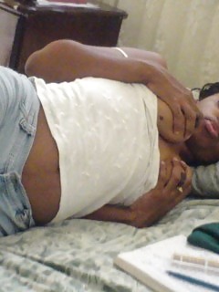 Pics Of A Skanky Black Beauty Chick Posing Dirty